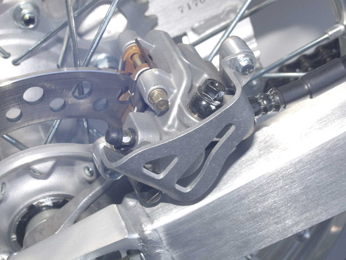 ALUM REAR CALIPER GUARD YZ WR 25-030 image 1